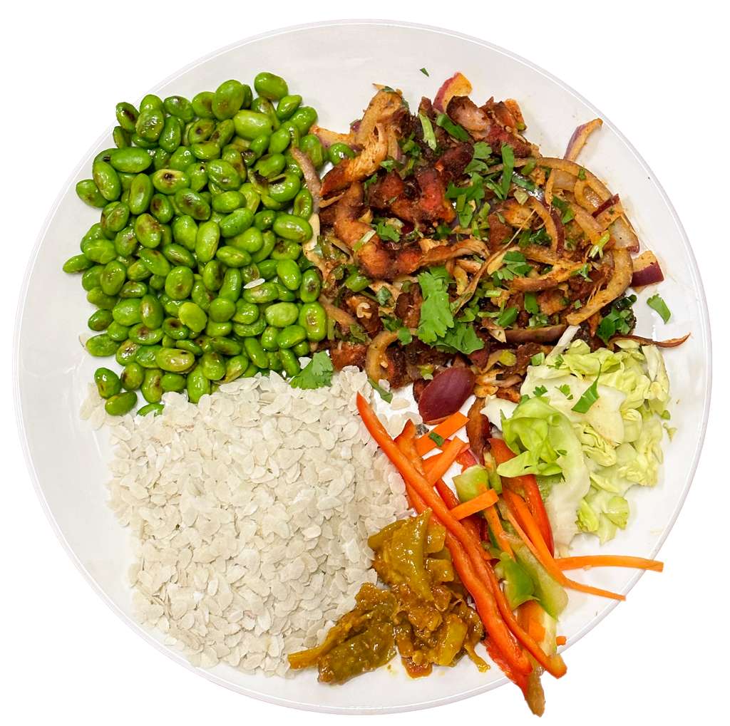 Nepali khaja set with rice, chicken, vegetables, and achar